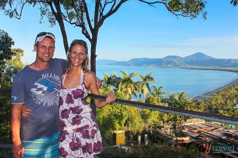 Port Douglas people posing to camera with view of 4 mile beach behind them